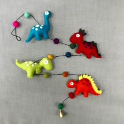 The Winding Road Dinosaur Felted Wool Garland Handcrafted In Nepal Global Fair Trade Gifts